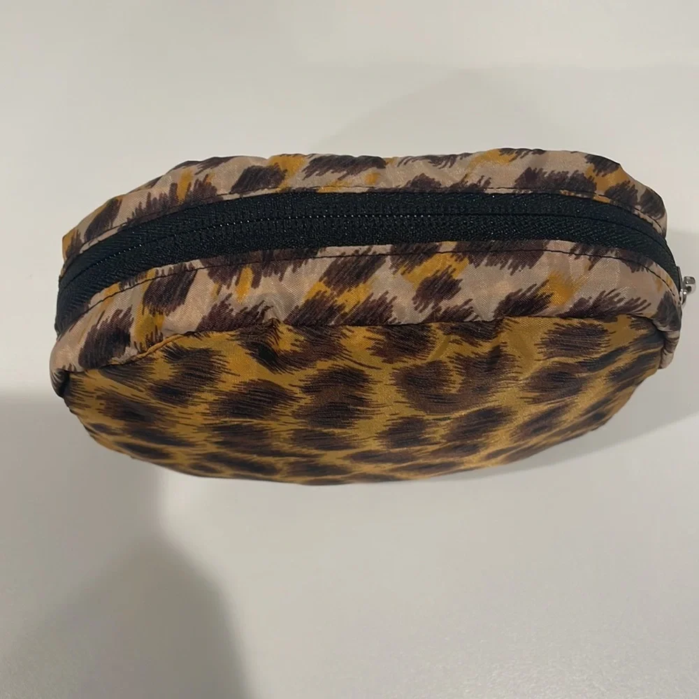 Nylon zipper tote with exterior zipper pocket. In Leopard. NWOT